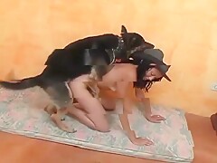 A minx sucks her dog’s cock and swallows his sperm