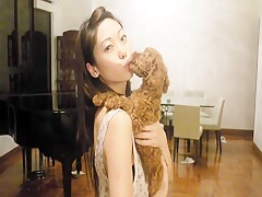 Girl kissing dog